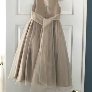 Flower girl dress size 7,wore only once. beige excellent condition and quality